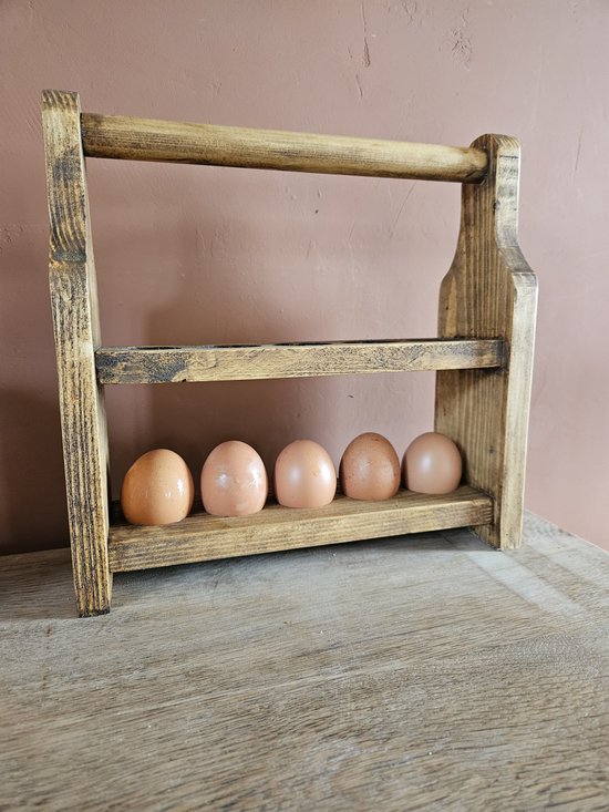 Houten eierrekje met 5 lichte eieren.