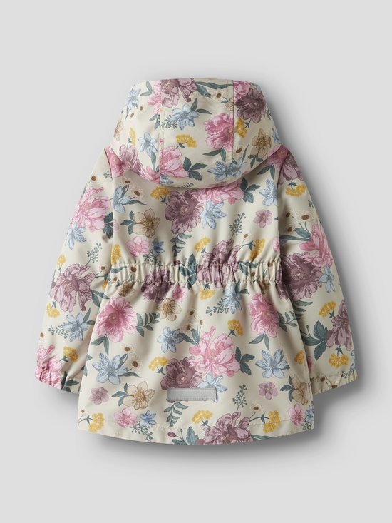 Achterkant van een beige jas met bloemenprint en een elastische tailleband.