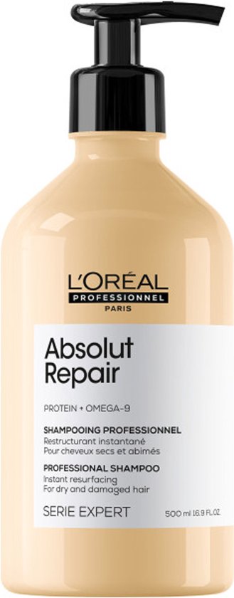 L'Oréal Professionnel Absolut Repair shampoing avec distributeur à pompe. Bouteille beige avec étiquette blanche.