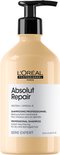 L'Oréal Professionnel Absolut Repair shampoing avec distributeur à pompe. Bouteille beige avec étiquette blanche.