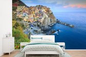 Behang - Fotobehang Verlicht dorp Manarola in de Cinque Terre - Breedte 525 cm x hoogte 350 cm