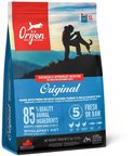 Orijen Original hondenvoerzak met afbeelding van persoon en hond in de bergen. Biologisch geschikt.