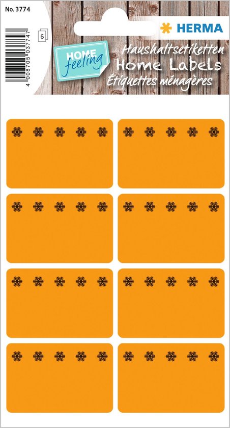 Pakje van acht oranje 'Home Labels' met zwarte sneeuwvlokken.