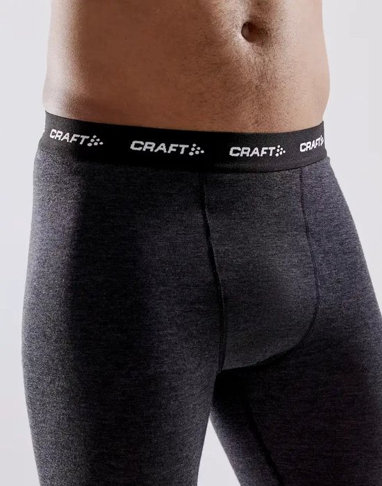 Close-up van de donkere antraciet thermobroek met logo tailleband.