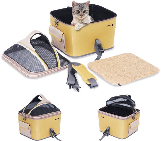 Gele fietsmand met grijze accenten, met een kat erin, en losse onderdelen: draagband, mat, manddelen.
