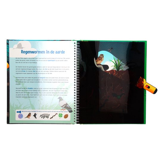 Pagina uit kinderboek met illustraties van regenwormen en dieren in de aarde.