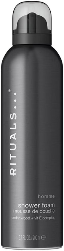 Grijze Rituals douchefoamspray met lichtgrijze dop. Tekst: 'homme shower foam, cedar wood + vit E complex'.