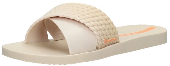 Beige Ipanema slipper met gekruiste, gevlochten band.