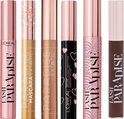 L'Oréal Paris Lash Paradise mascara's in roze, goud, zwart en bruin, met gouden en hartjesdetails.