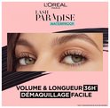 Close-up van groene ogen met volumineuze, lange zwarte wimpers na gebruik van Lash Paradise Waterproof mascara.