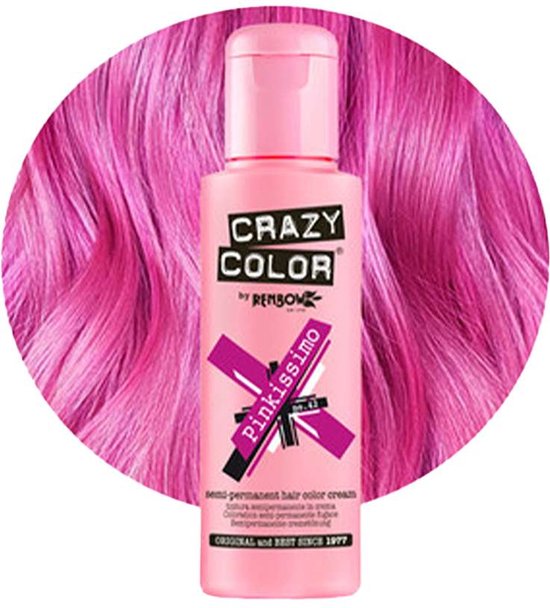 Roze flesje Crazy Color haarkleurcrème 'Pinkissimo' te midden van golvend felroze haar.