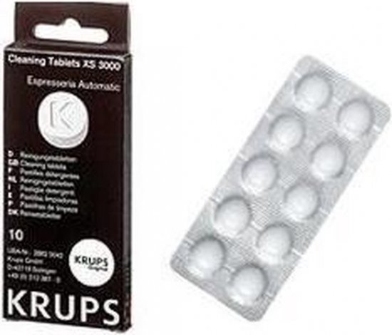 Zwarte Krups verpakking en strip met 10 witte reinigingstabletten.