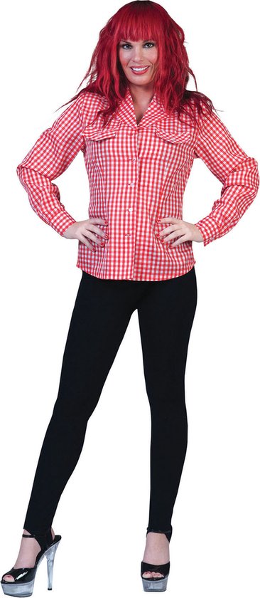 Vrouw met rood haar draagt een rood-wit geruite blouse en zwarte legging.