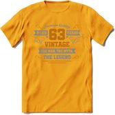 63 Jaar Legend T-Shirt | Goud - Zilver | Grappig Verjaardag Cadeau | Dames - Heren | - Geel - L