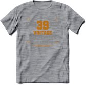 39 Jaar Legend T-Shirt | Goud - Zilver | Grappig Verjaardag Cadeau | Dames - Heren | - Donker Grijs - Gemaleerd - S