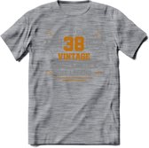 38 Jaar Legend T-Shirt | Goud - Zilver | Grappig Verjaardag Cadeau | Dames - Heren | - Donker Grijs - Gemaleerd - L