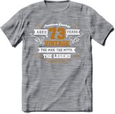 73 Jaar Legend T-Shirt | Goud - Wit | Grappig Verjaardag en Feest Cadeau Shirt | Dames - Heren - Unisex | Tshirt Kleding Kado | - Donker Grijs - Gemaleerd - XXL