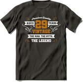 29 Jaar Legend T-Shirt | Goud - Wit | Grappig Verjaardag en Feest Cadeau Shirt | Dames - Heren - Unisex | Tshirt Kleding Kado | - Donker Grijs - L