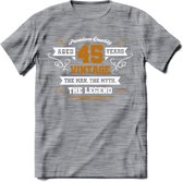 45 Jaar Legend T-Shirt | Goud - Wit | Grappig Verjaardag en Feest Cadeau Shirt | Dames - Heren - Unisex | Tshirt Kleding Kado | - Donker Grijs - Gemaleerd - XXL