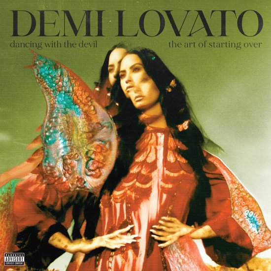 Demi Lovato op albumhoes 'Dancing With The Devil... The Art Of Starting Over', met rode jurk en oranje vleugels.