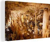 Canvas Schilderij Grot met stalagmieten en stalactieten - 60x40 cm - Wanddecoratie