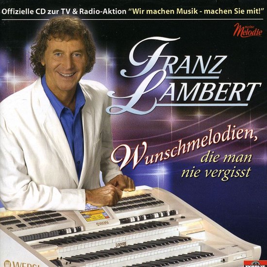 Franz Lambert met een wit jasje en blauw shirt, staand achter een keyboard. "Wunschmelodien, die man nie vergi"