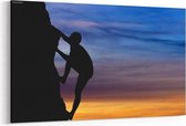 Schilderij - Rotsklimmer bij zonsondergang — 100x70 cm