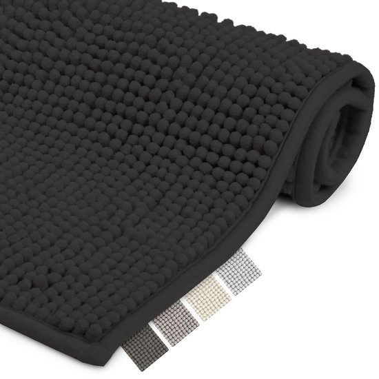 Rol van zwarte badmat met bobbelstructuur, met voorbeelden van andere kleuren.