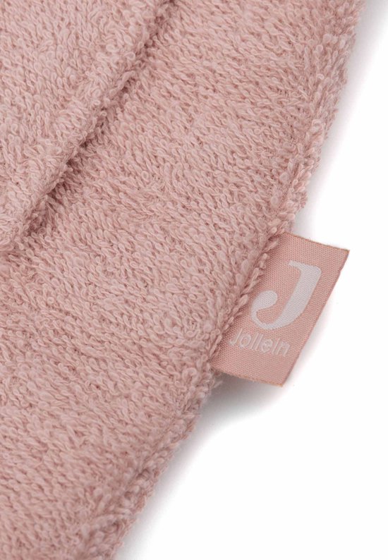 Tissu éponge rose avec une étiquette Jollein.
