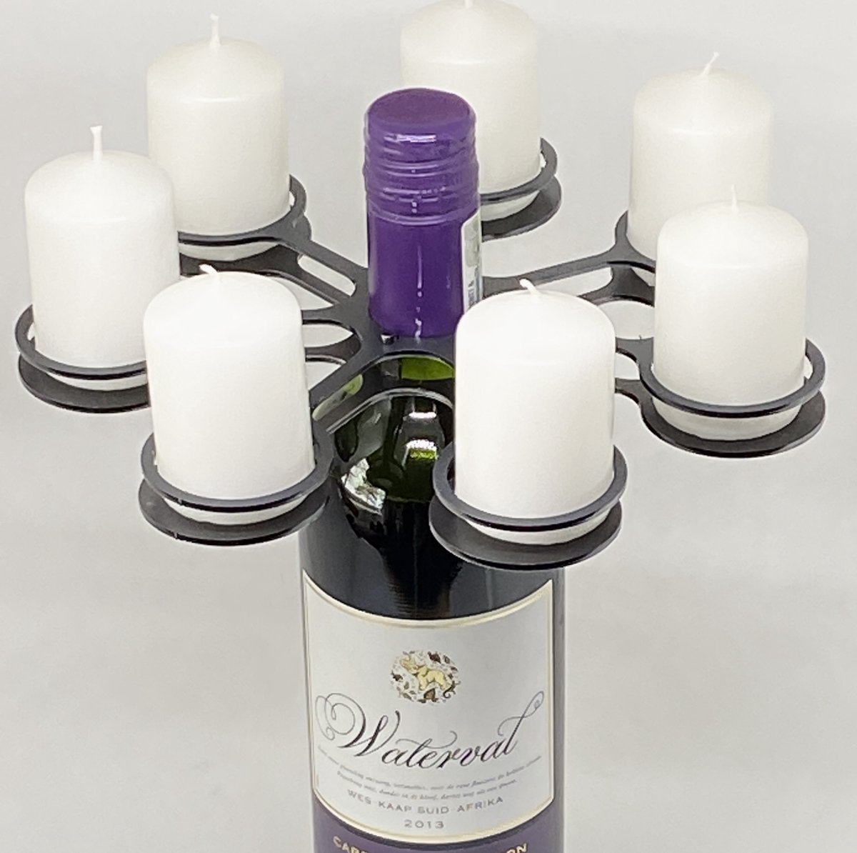'CLASSIC' solo - kandelaar| voor 7 lichtjes of kaarsen / kleur: zwart/ materiaal: metaal 22 cm rond / 1,7 cm hoog voor op een fles of op tafel.