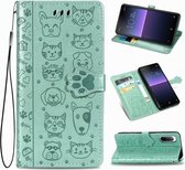 Voor Sony Xperia 10 II Leuke Kat en Hond Reliëf Horizontale Flip Leren Case met Beugel / Kaartsleuf / Portemonnee / Lanyard (Groen)