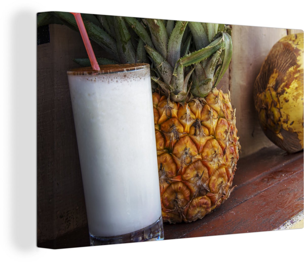 Canvas Schilderij De pina colada staat naast een verse ananas en een kokosnoot - 60x40 cm - Wanddecoratie