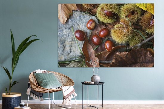 Canvas schilderij 150x100 cm - Wanddecoratie Zoete tamme kastanjes liggend op de herfstgrond - Muurdecoratie woonkamer - Slaapkamer decoratie - Kamer accessoires - Schilderijen