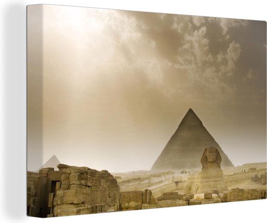 Foto: Canvas schilderij de sfinx van gizeh en piramide in een zandstorm 120x80 cm wanddecoratie