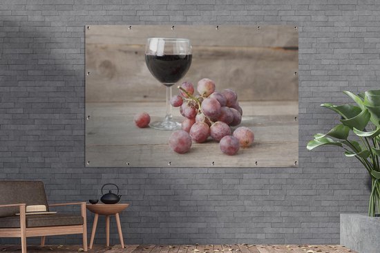Gros plan de raisins et verre de vin Affiche de jardin 180x120 cm - Toile de jardin / Toile d'extérieur / Peintures d'extérieur (décoration de jardin) XXL / Groot format!