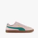 Roze Puma sneaker met groene streep op de zijkant en een bruine zool.