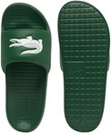 Donkergroene Lacoste slipper, bovenkant met witte krokodillenopdruk en geribbelde zool.