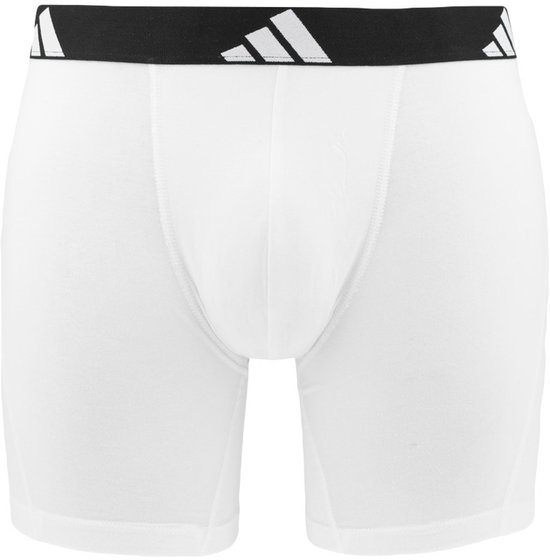 Wit boxerhort met zwarte band met witte Adidas logo's.
