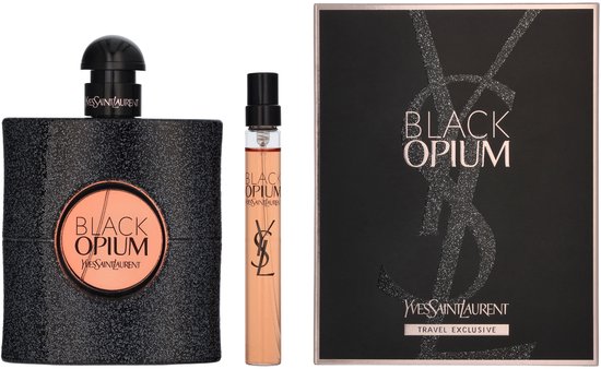 Yves Saint Laurent Black Opium giftset met glinsterende zwarte flacon, rollerball en doos met glinsterend YSL-logo.