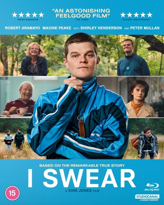 Filmaffiche voor 'I Swear' met Robert Aramayo in een blauw sportjack, omringd door de cast. 'An Astonishing Feelgood Film'.