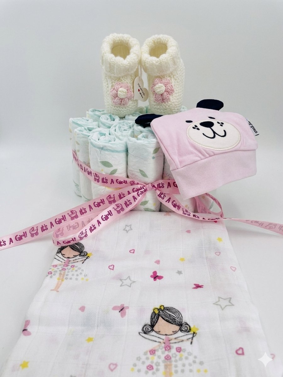 Luiertaart | Handgemaakte Babyslofjes | Muts | Katoenen hydrofiele doek | Pampers luiers | Kraamcadeau | Babyshower | Maminobaby.nl