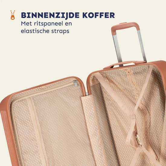 Roze koffer van binnen met ritsvak en elastische banden.