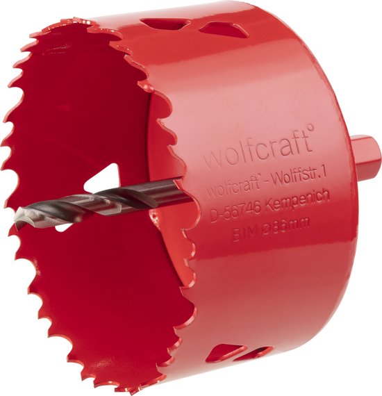 Rode Wolfcraft gatenzaag met scherpe tanden en boor, merk- en maatgegevens zichtbaar.