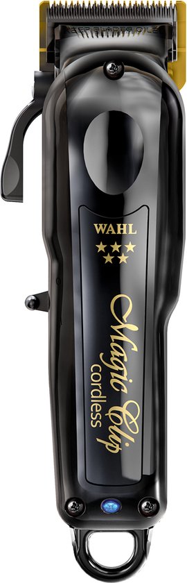 Zwarte Wahl Magic Clip tondeuse met gouden mesjes en drie sterren.