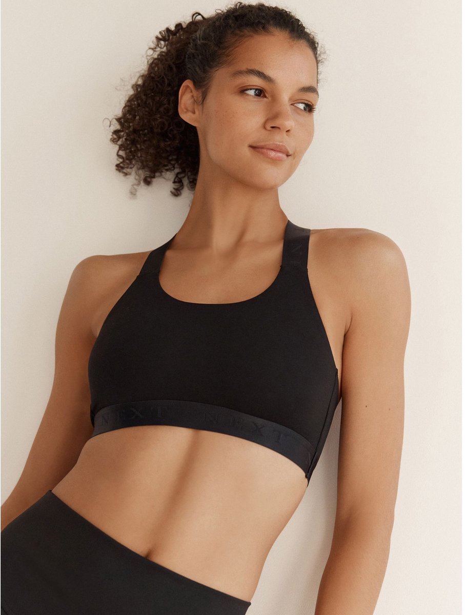 Next Dames - Korte top voor actieve sporten met weinig impact voor ultiem comfort - Zwart