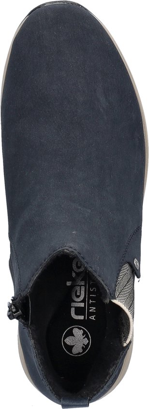 Bovenaanzicht van donkerblauwe enkellaars met rits, visgraatdetails en beige zool.