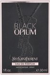 Zwarte Yves Saint Laurent 'Black Opium' verpakking met glitterende YSL logo's en tekst.