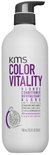 Witte KMS Color Vitality Blonde Conditioner fles met grijze pompdispenser en een granaatappel-icoon.