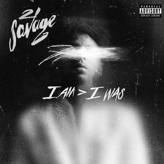 De albumhoes van "I AM > I WAS" met de artiest, gezicht bedekt met witte strepen. Parental Advisory expliciete content.