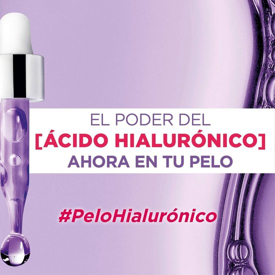 Compte-gouttes violet avec du sérum et des bulles. Texte: 'EL PODER DEL [ÁCIDO HIALURÓNICO] AHORA EN TU PELO'.